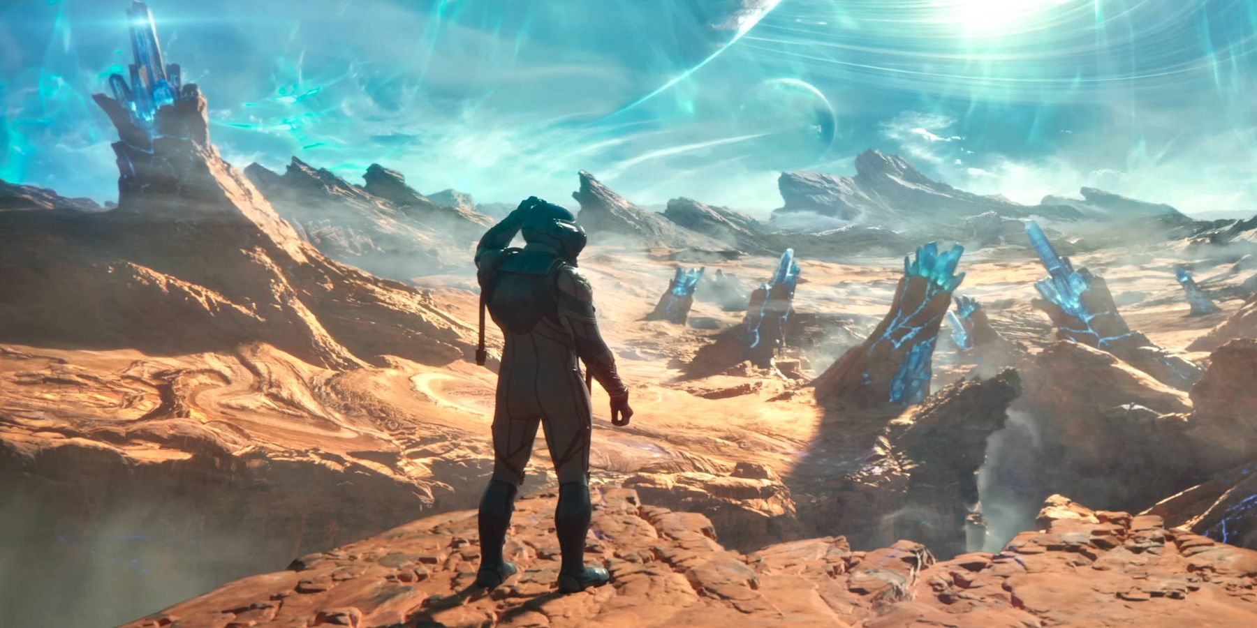 A silhouetted man observing a desert planet in The Outer Worlds.