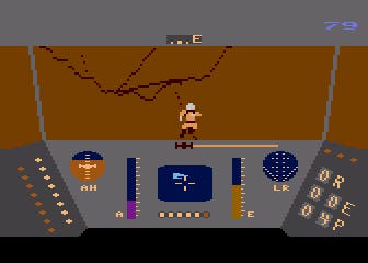 A screenshot from the Atari 8-Bit version of Rescue on Fractalus, where an injured pilot runs towards the ship.