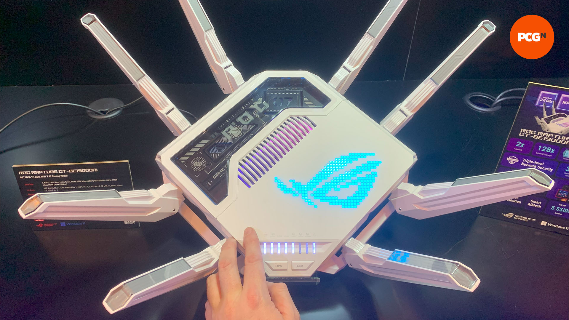 asus rog rapture gt-be19000ai gaming wifi router hand size comparison