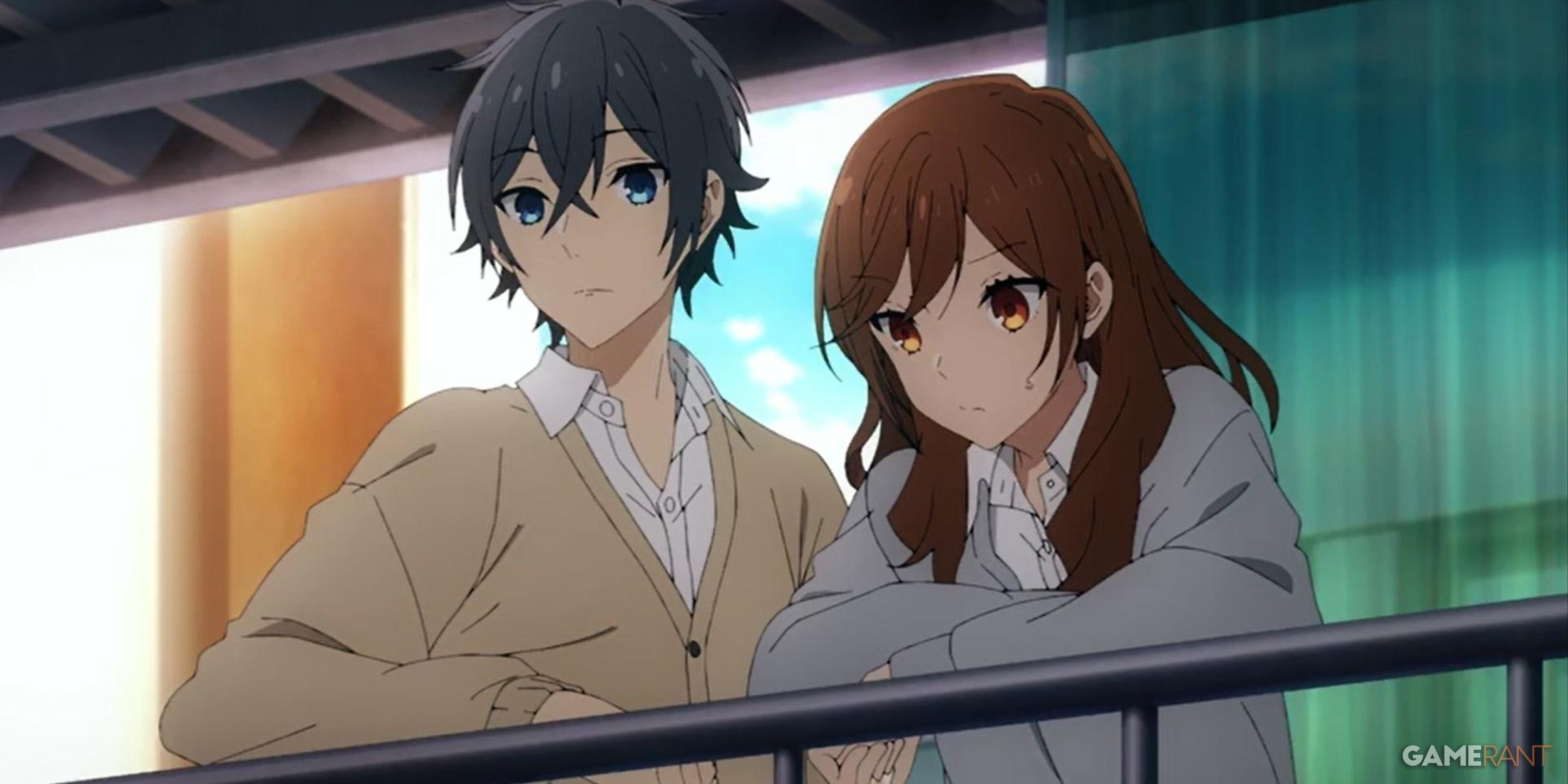 a female anime character is with her arms crossed standing next to a male anime character.  