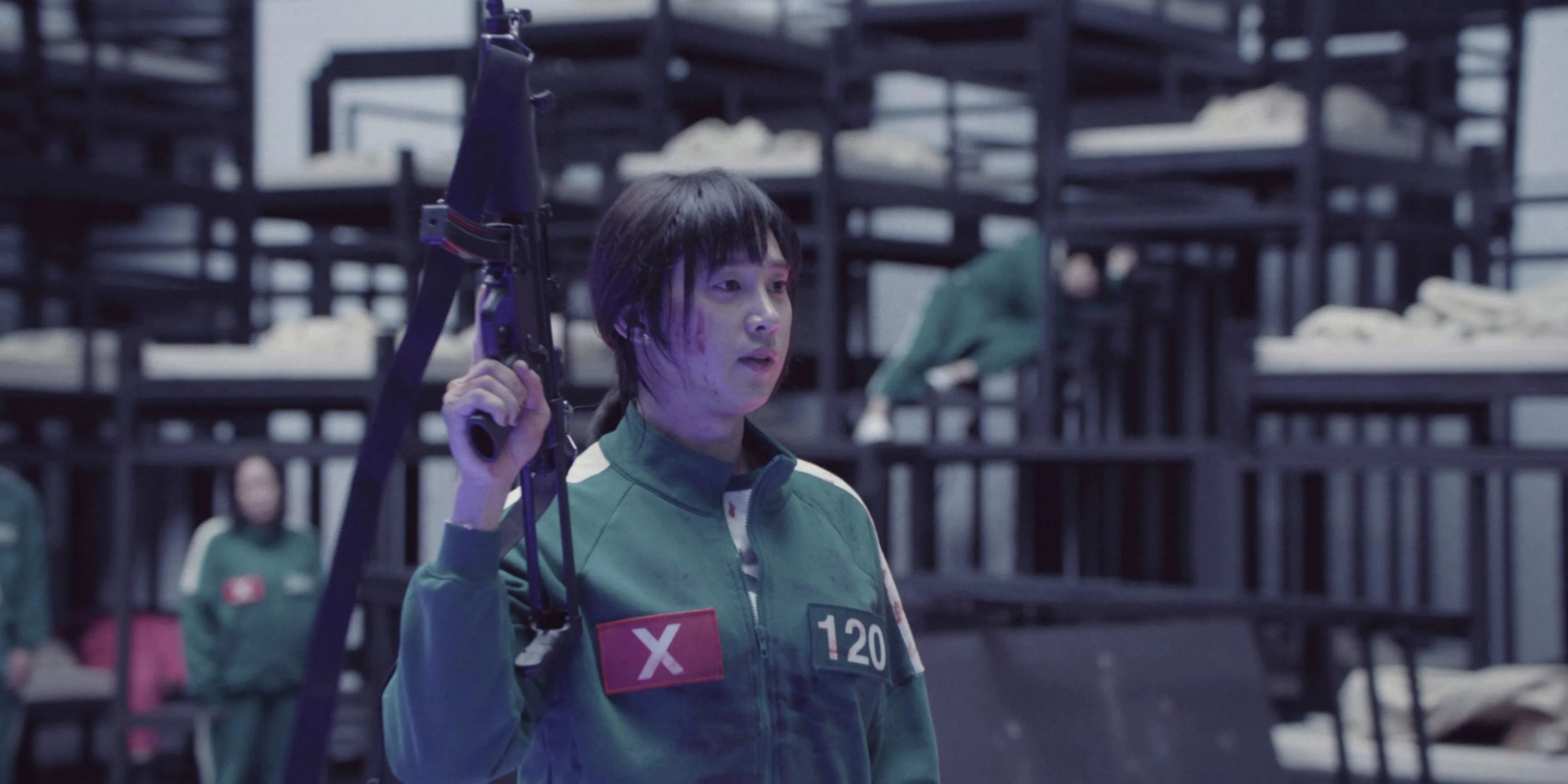 Cho Hyun-ju using a gun in Squid Game