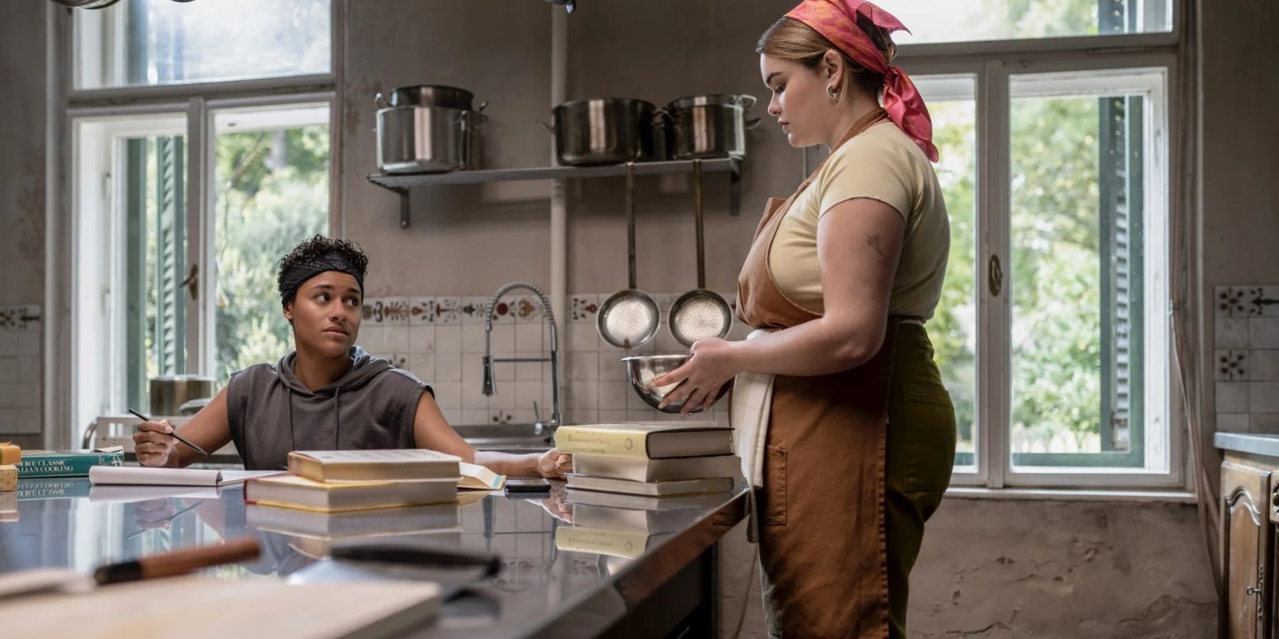 Chef (Ariana DeBose) and Lucia (Barbie Ferreira) in House of Spoils