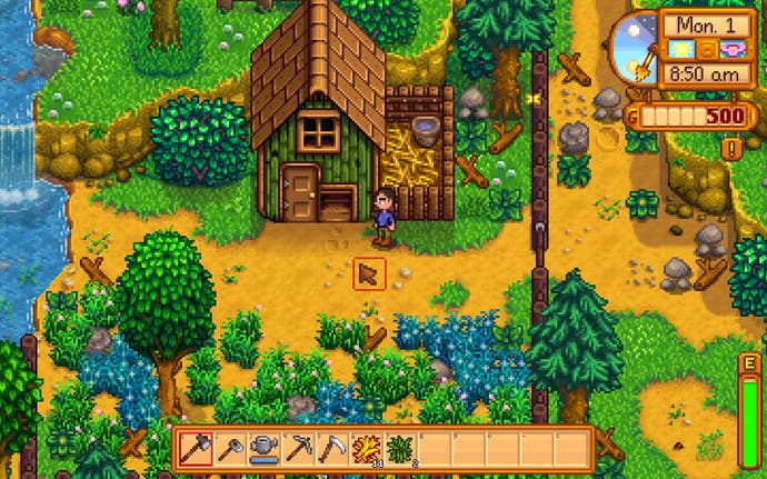 A farmer stands outside their house in Stardew Valley.