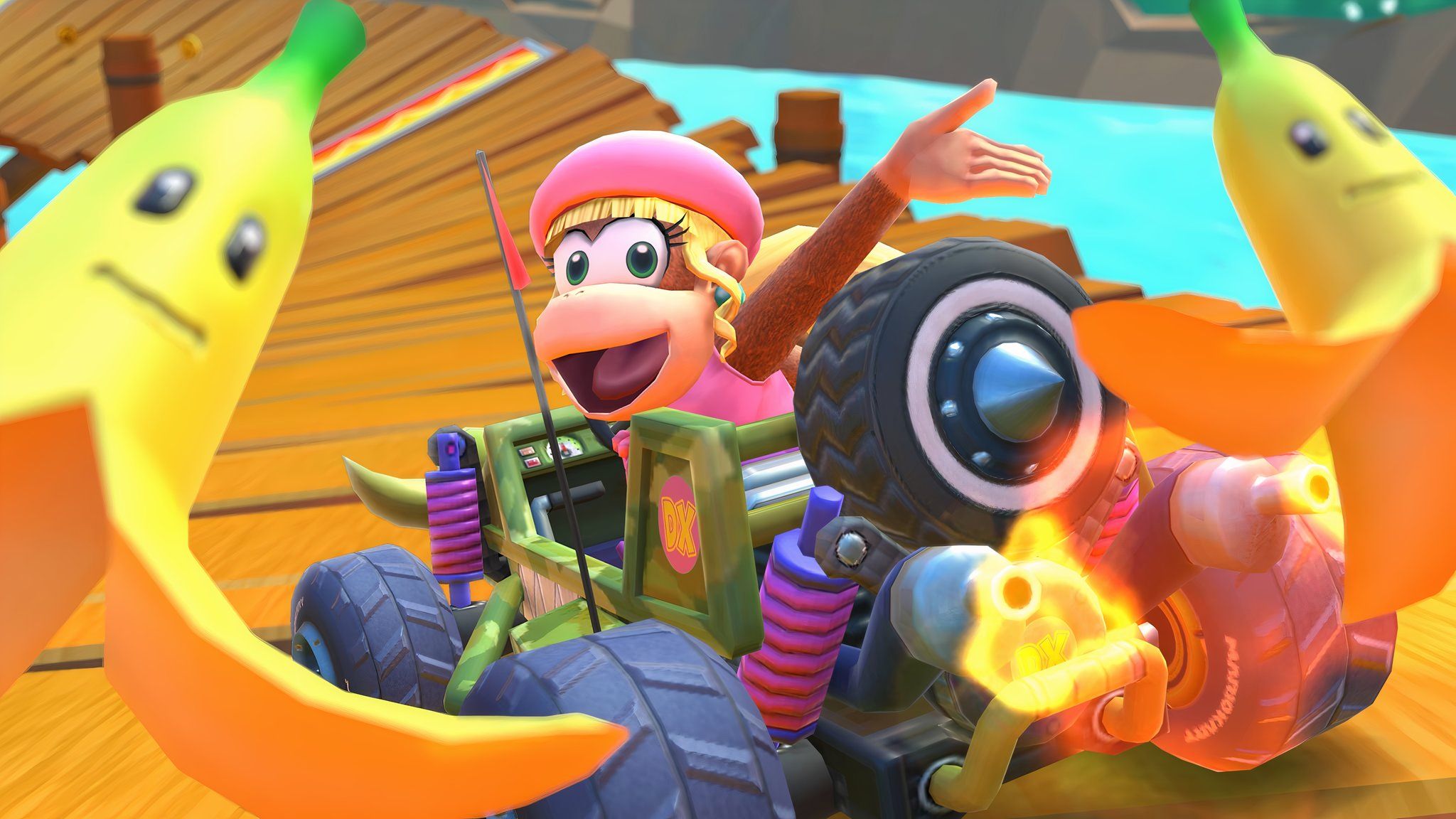 Dixie Kong throwing bananas at other racers in Mario Kart Tour.