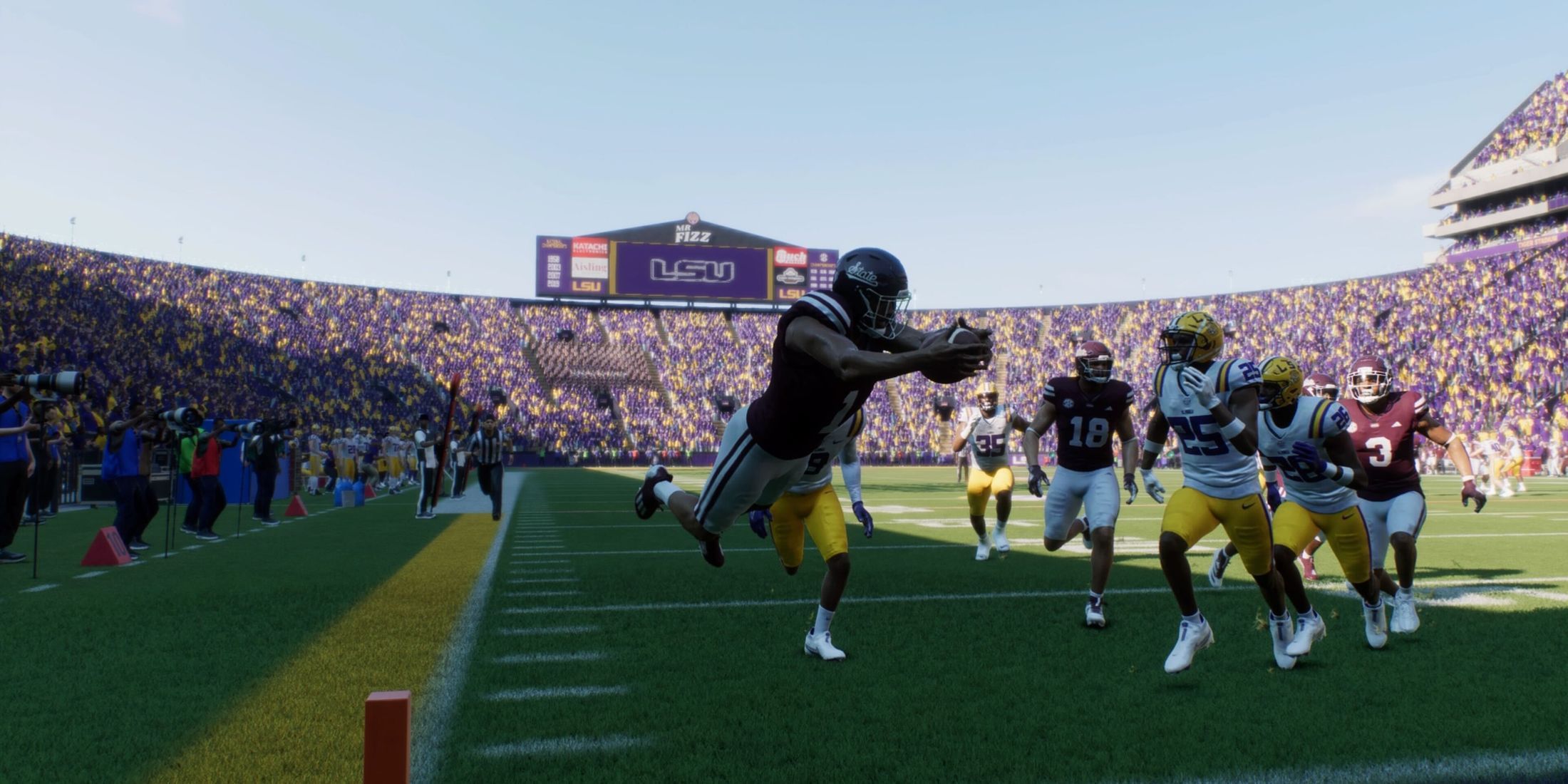 A player diving for a touchdown in College Football 25