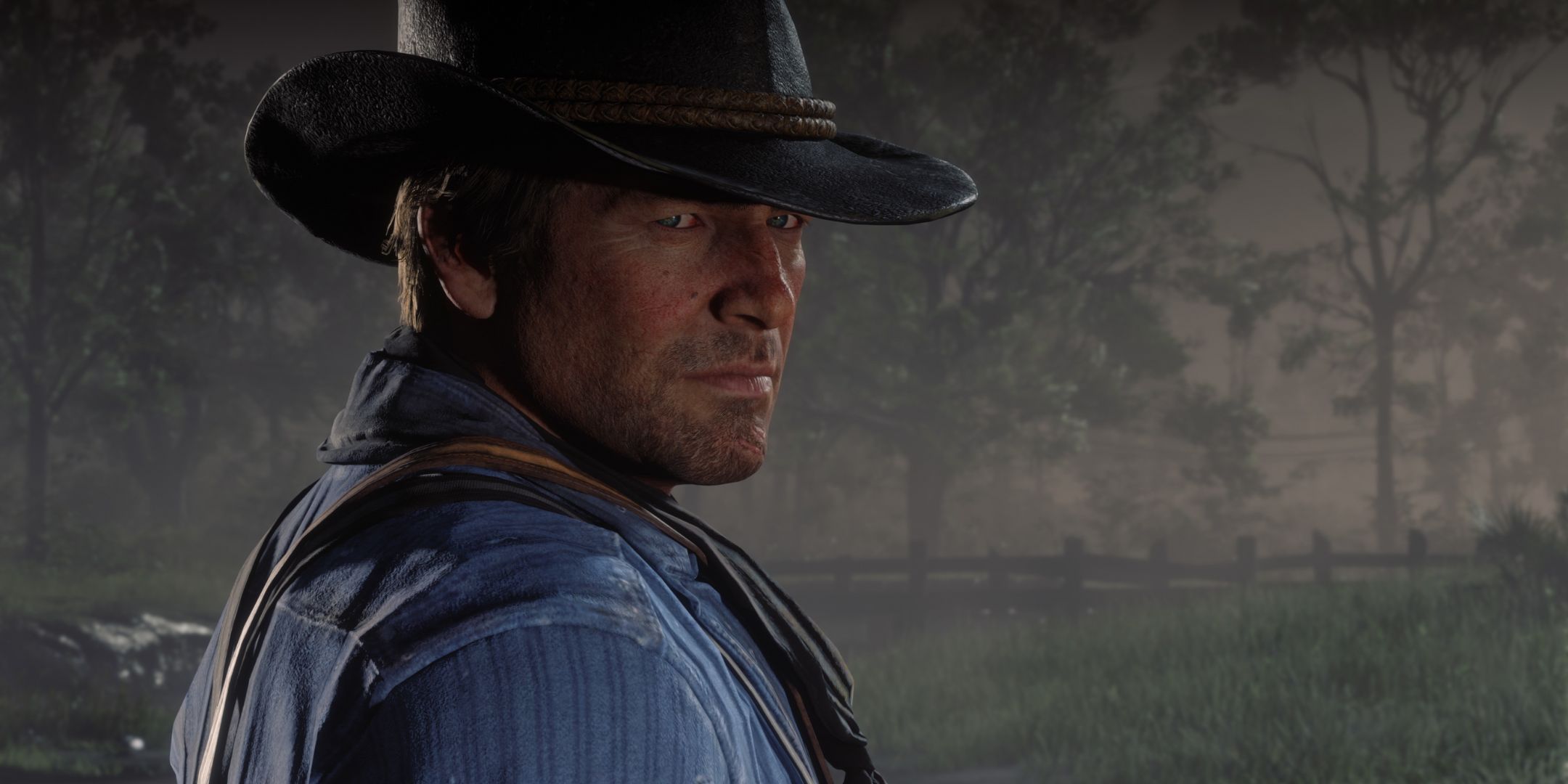 Arthur Morgan looking at the camera in Red Dead Redemption 2.