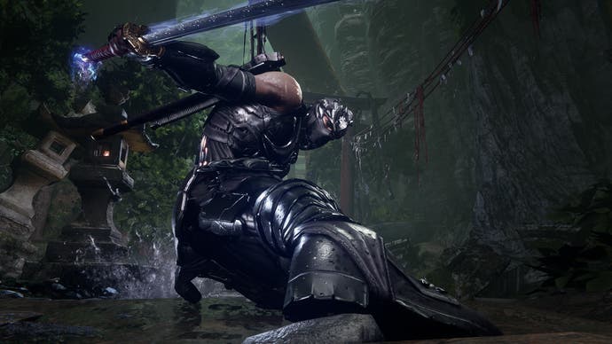 Ninja Gaiden 4 screenshot showing ninja Ryu sliding towards the camera foot-first