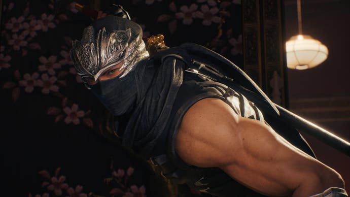 Ryu stares at the camera in a stylish stance in Ninja Gaiden 2 Black.