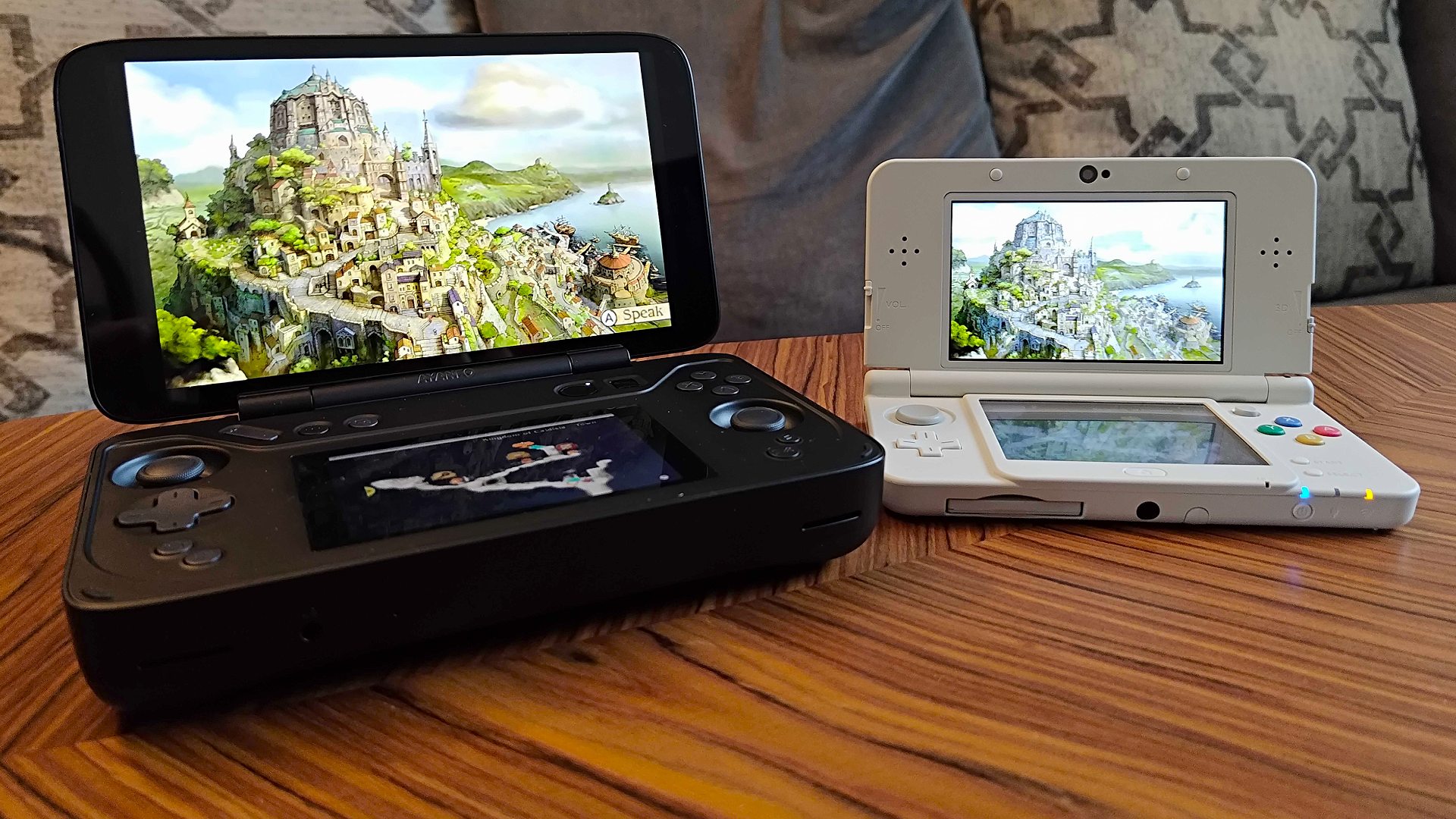 Ayaneo Flip DS next to original 3DS with both consoles playing Bravely Default