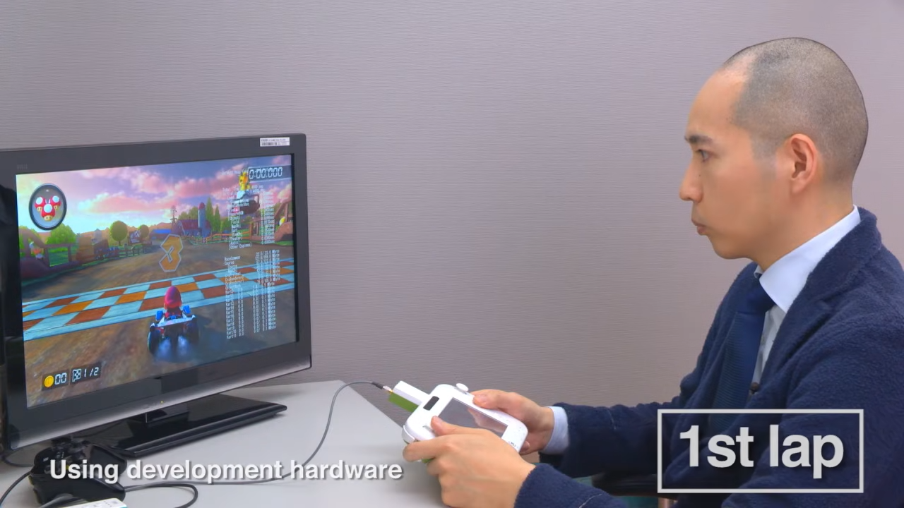 Nintendo developer Kosuke Yabuki using Wii U gamepad to play Mario Kart 8