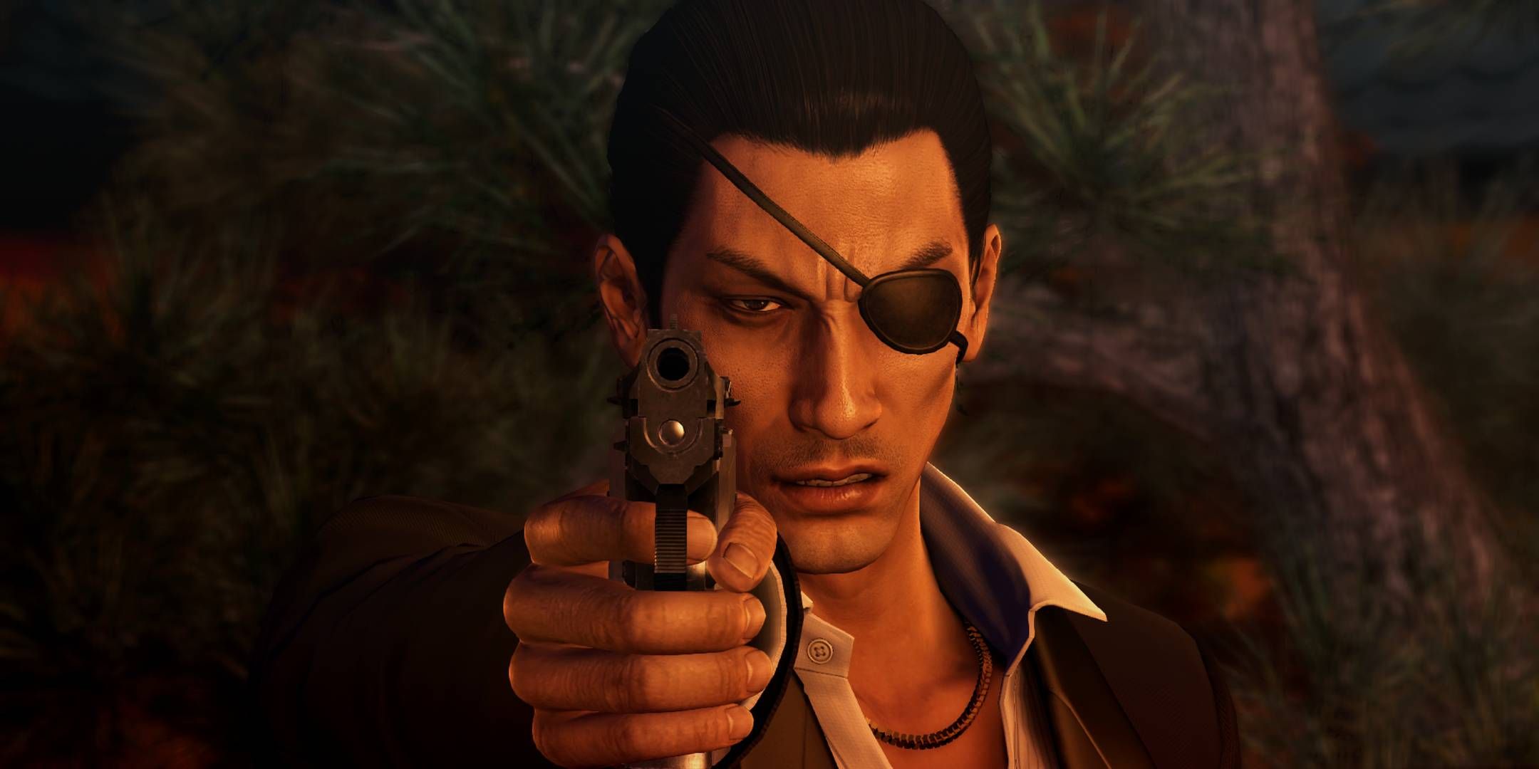 Yakuza 0 screenshot of Goro Majima pointing a gun at the camera.