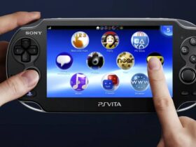 Someone holding a PS Vita.