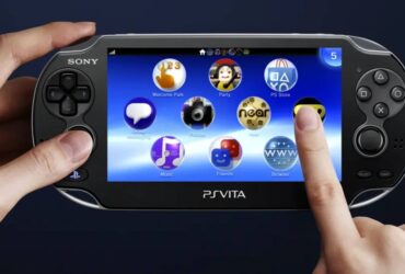 Someone holding a PS Vita.