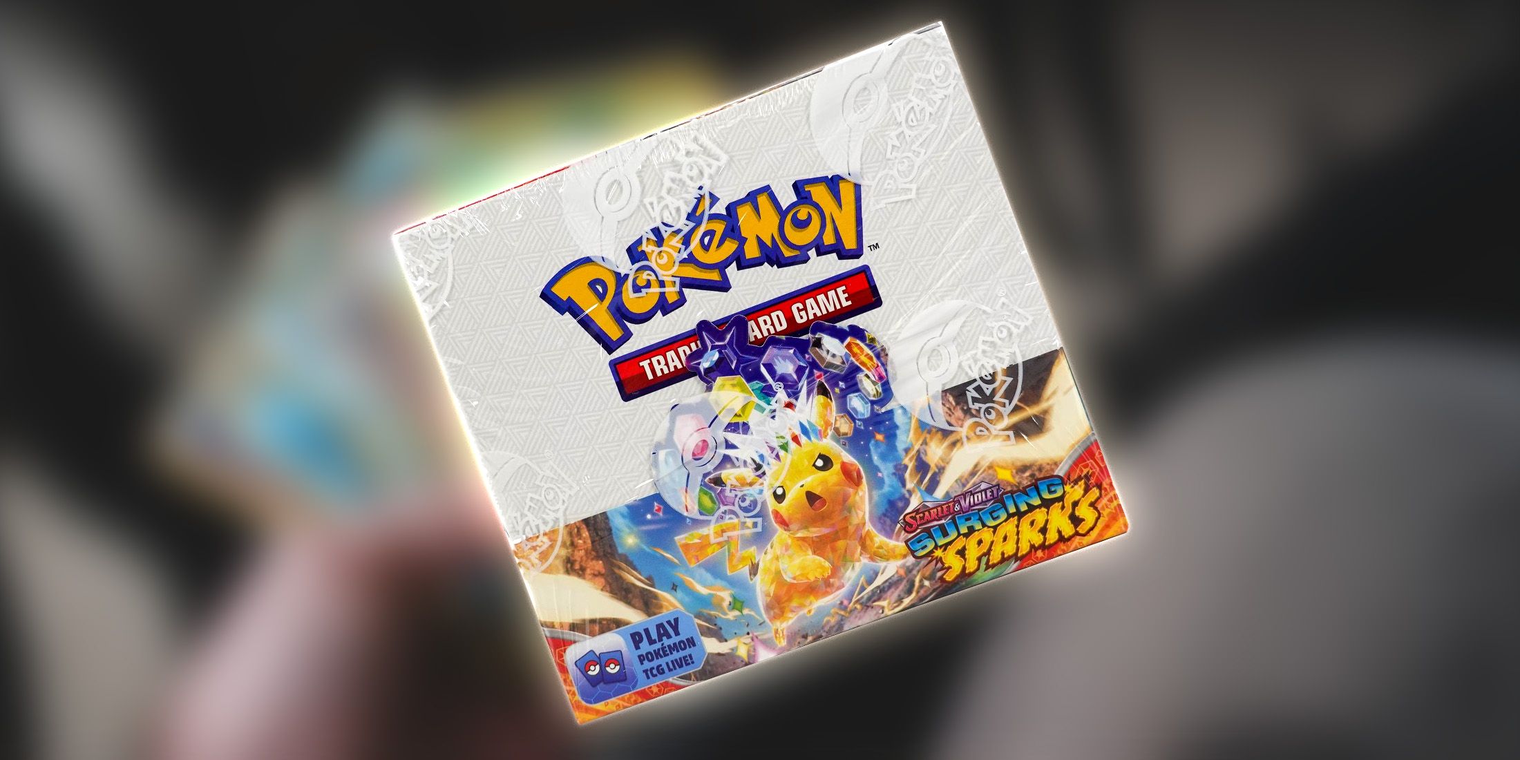 pokemon tcg fan pulls rare pikachu ex from surging sparks box