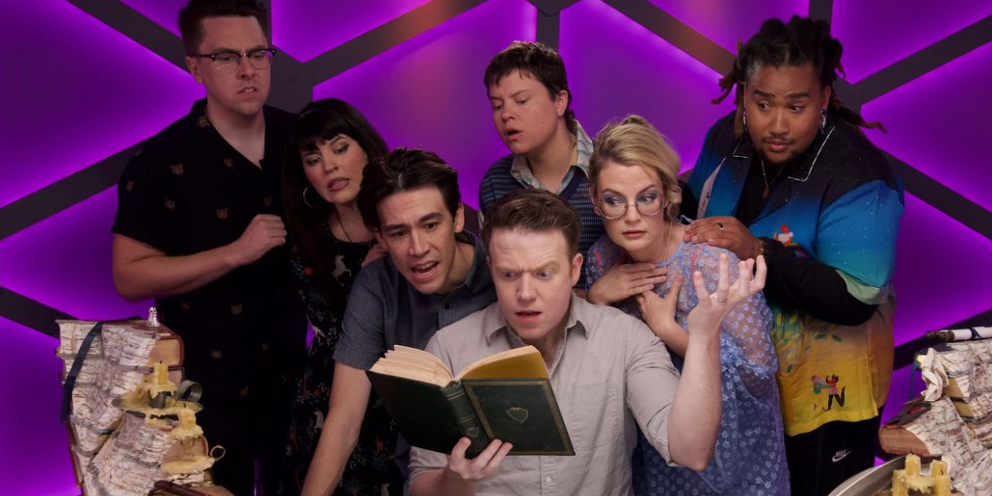 dimension 20 neverafter promo brian murphy emily axford zac oyama brennan lee mulligan ally beardsley siobhan thompson and lou wilson group photo reading a book