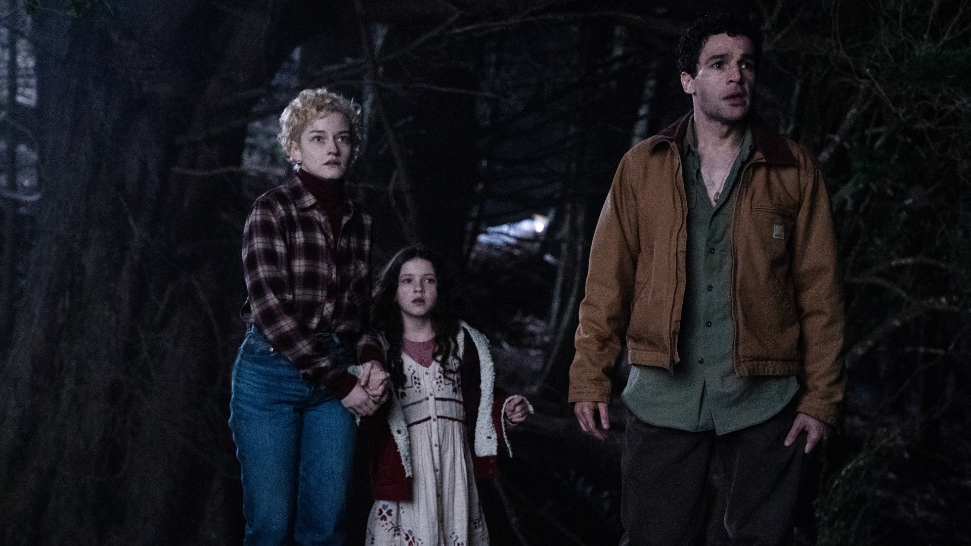 Julia Garner as 'Charlotte', Matilda Firth as 'Ginger', and Christopher Abbott as 'Blake' in Wolf Man