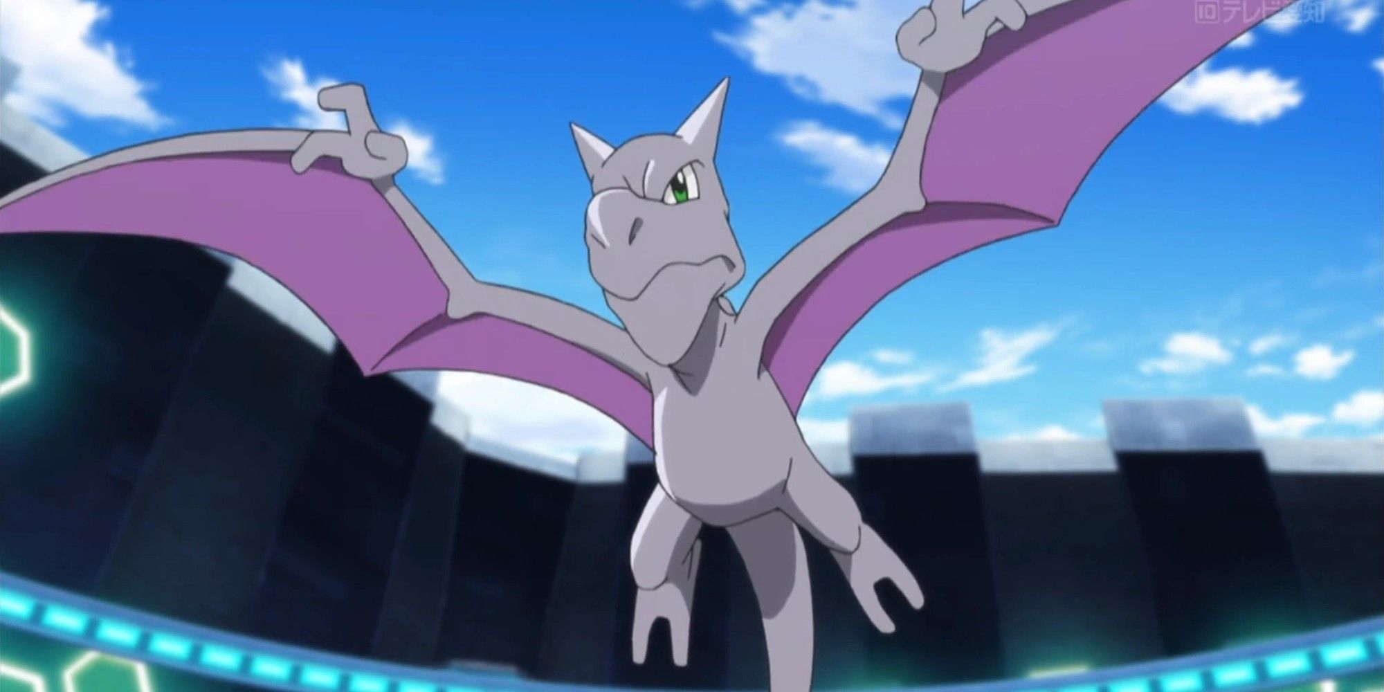 Aerodactyl from the Pokemon anime, flying and looking focused in a stadium.