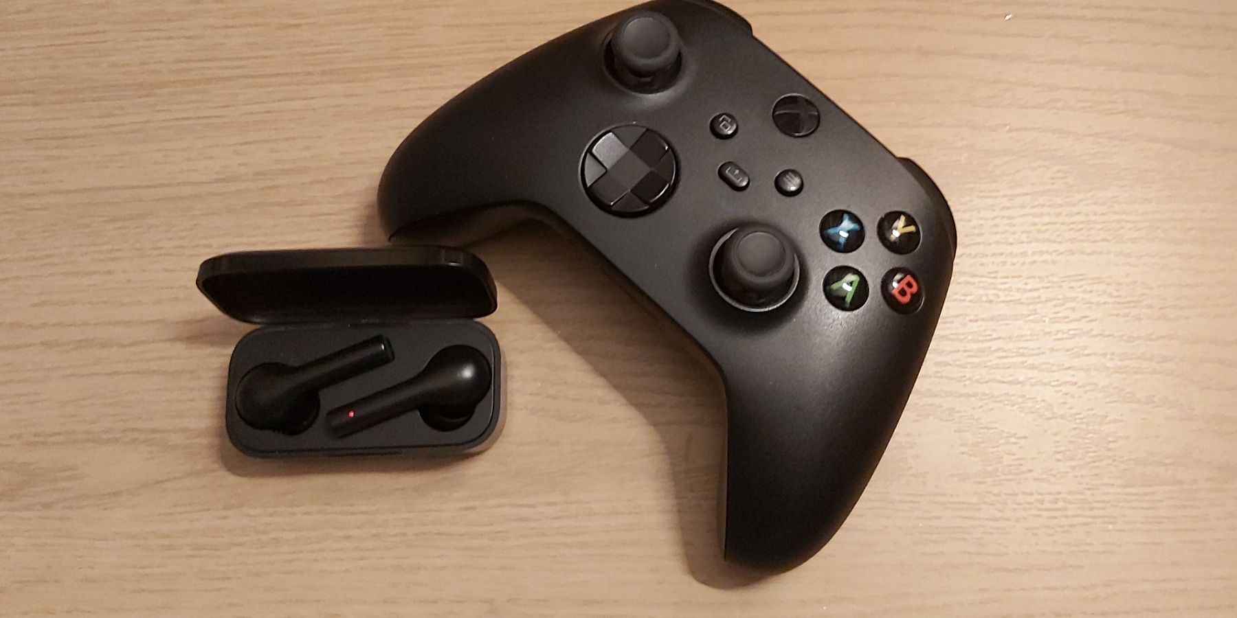 An Xbox controller and Bluetooth headset