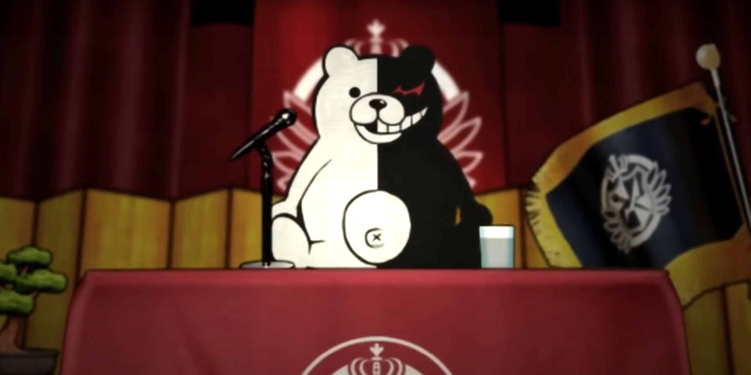 Monokuma sitting on a desk from Danganronpa.