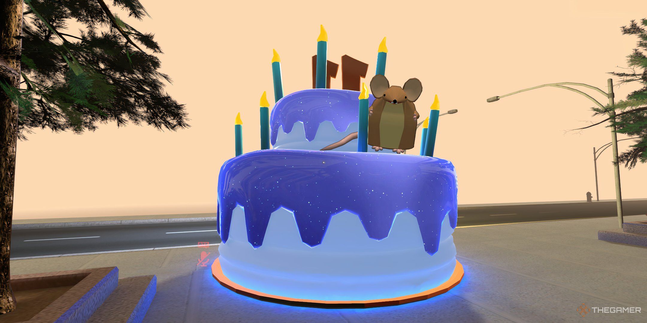 The VRChat mouse sat on a birthday cake in VRChat's original world.