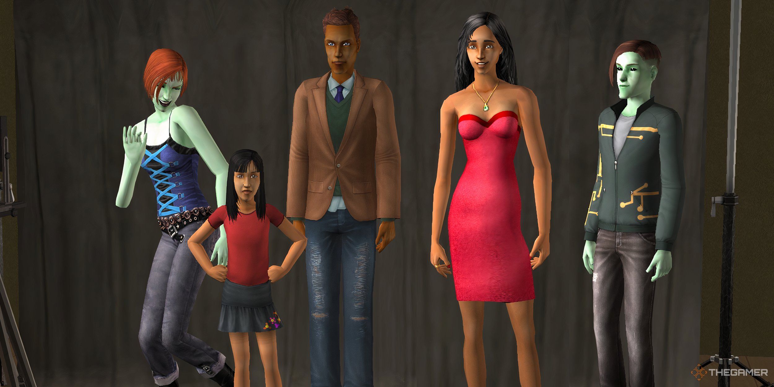 Several sims posing in front of a backdrop.