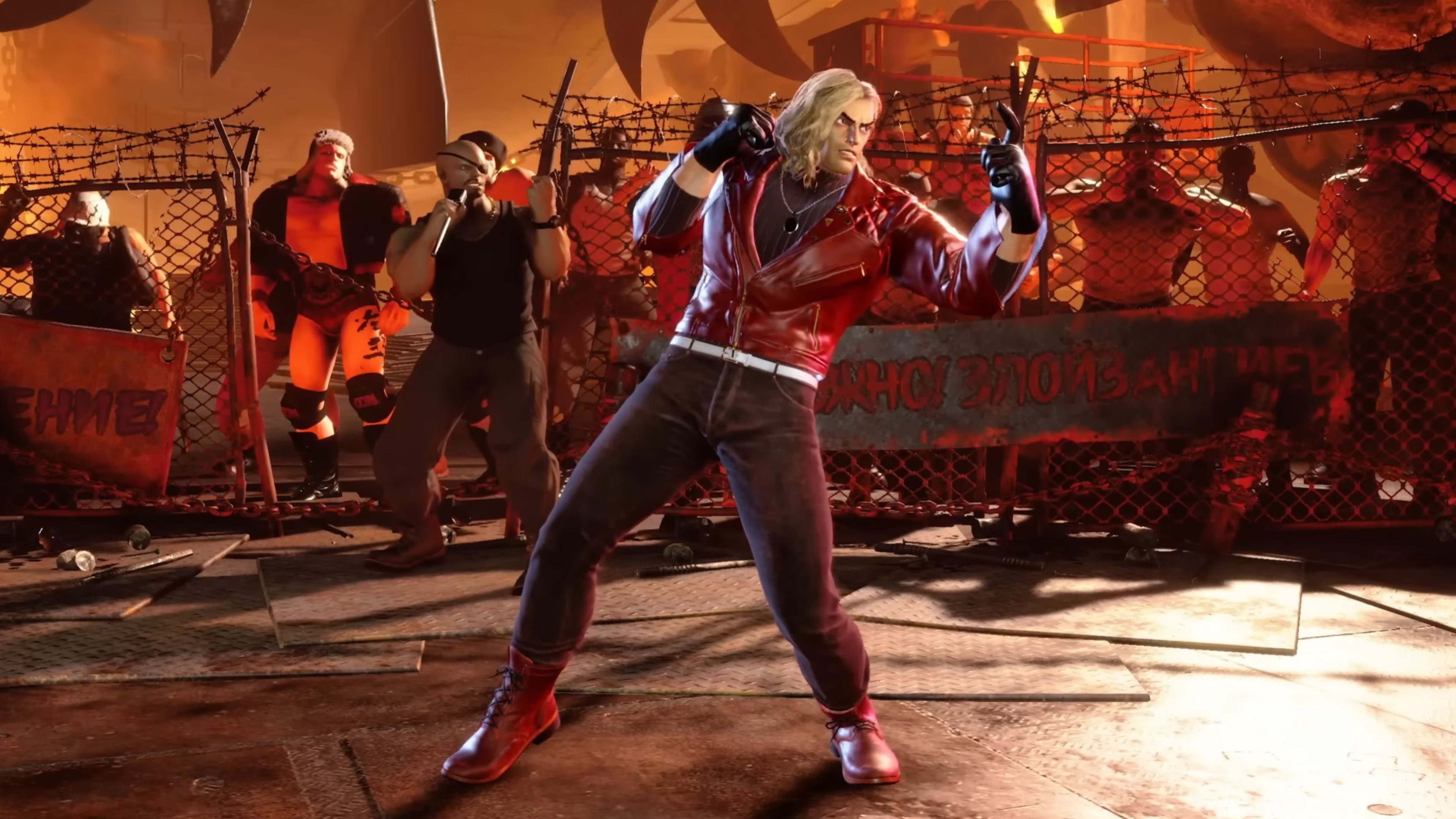 Ken standing in a Steelworks Facility in Street Fighter 6.