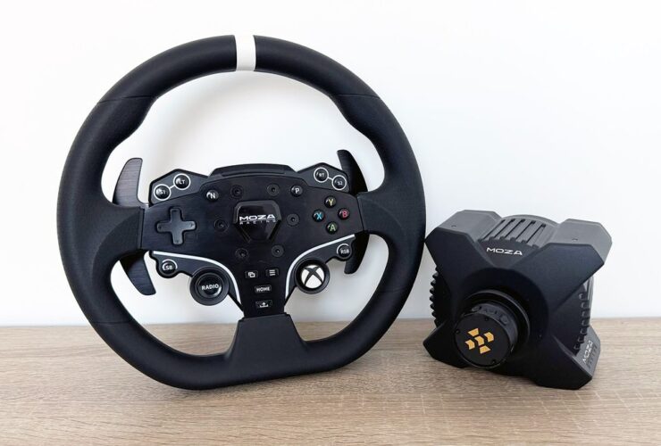 The Moza R3 racing wheel next to its wheelbase