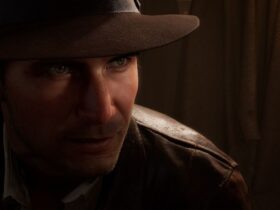 Indiana Jones and The Great Circle - Indiana peers out from the shadows in stealth