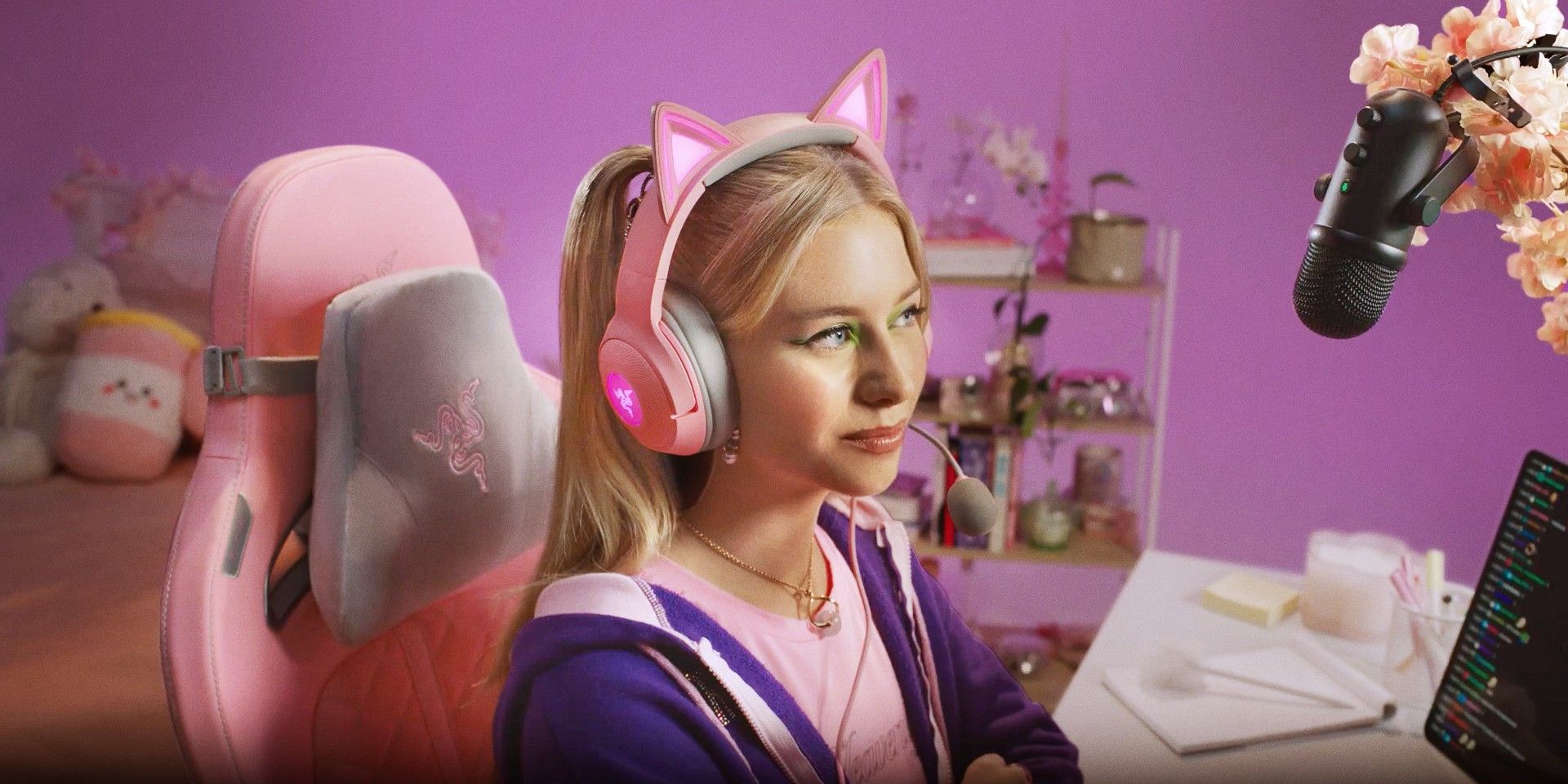 Gamer wearing the pink Razer Kraken Kitty V2 headset