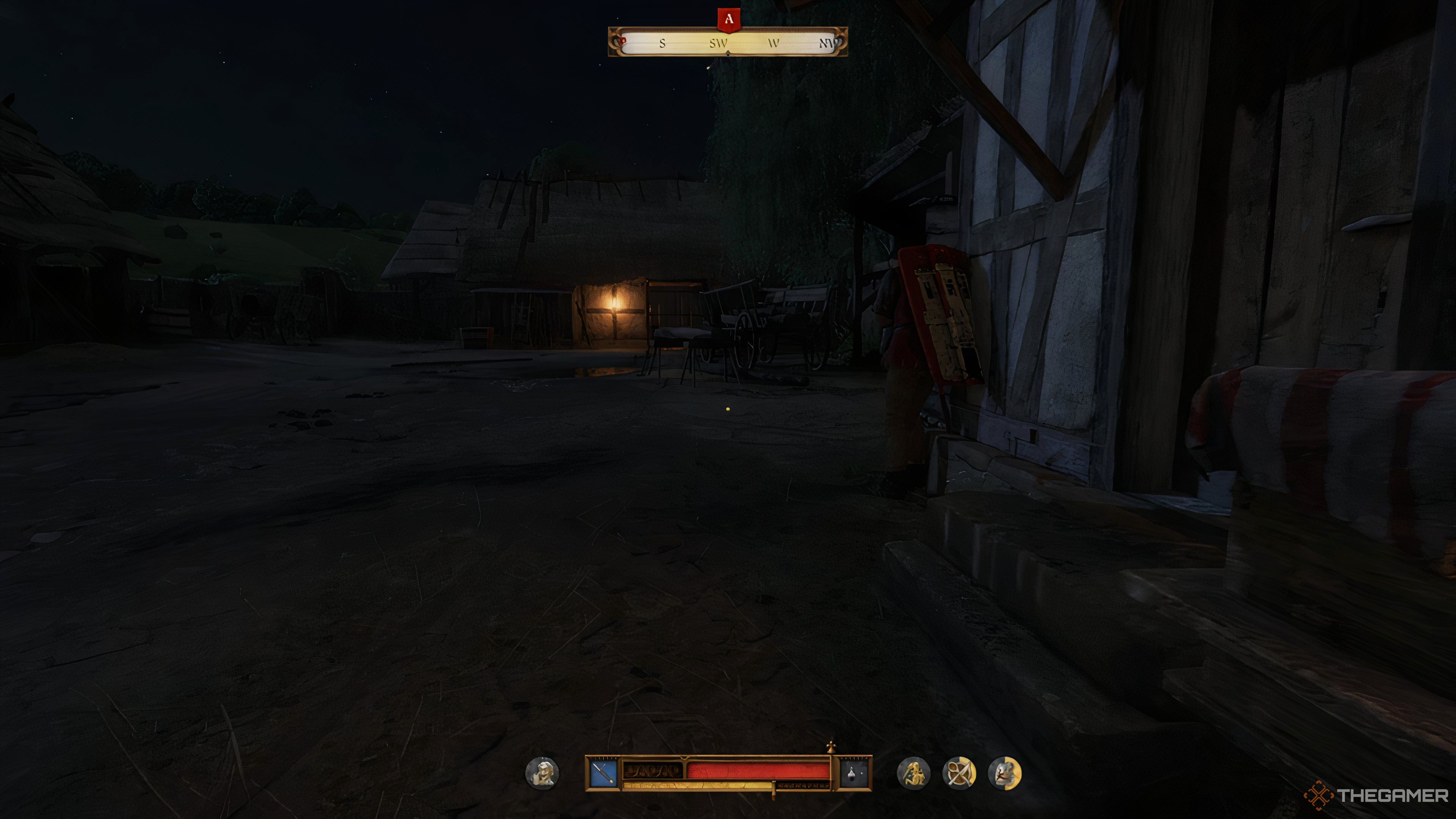 A barn with a light on in Kingdom Come: Deliverance 2, with a guard next to it.