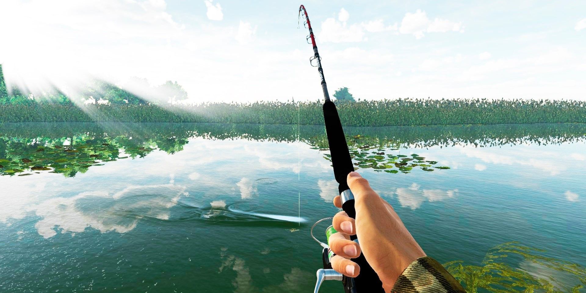 The Fisherman Fishing Planet PS hand holding fishing rod catching fish