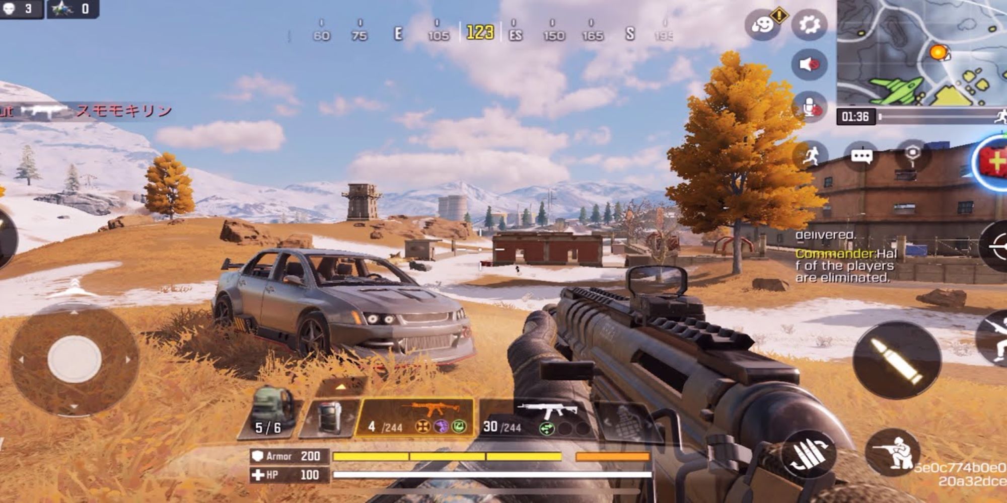 Call of Duty: Mobile Gameplay with an assault rifle, near a car and tree with HUD elements displayed.