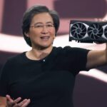 AMD CEO Lisa Su holding Radeon graphics card on stage