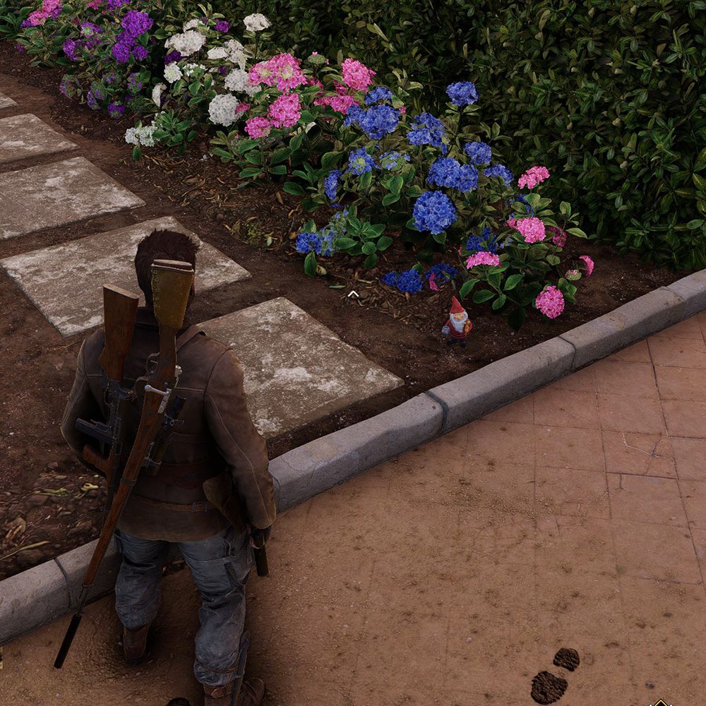 Sniper Elite gnome in a flowerbed-1