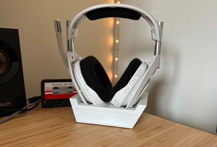 Astro A50 X headset in dock on a wooden table