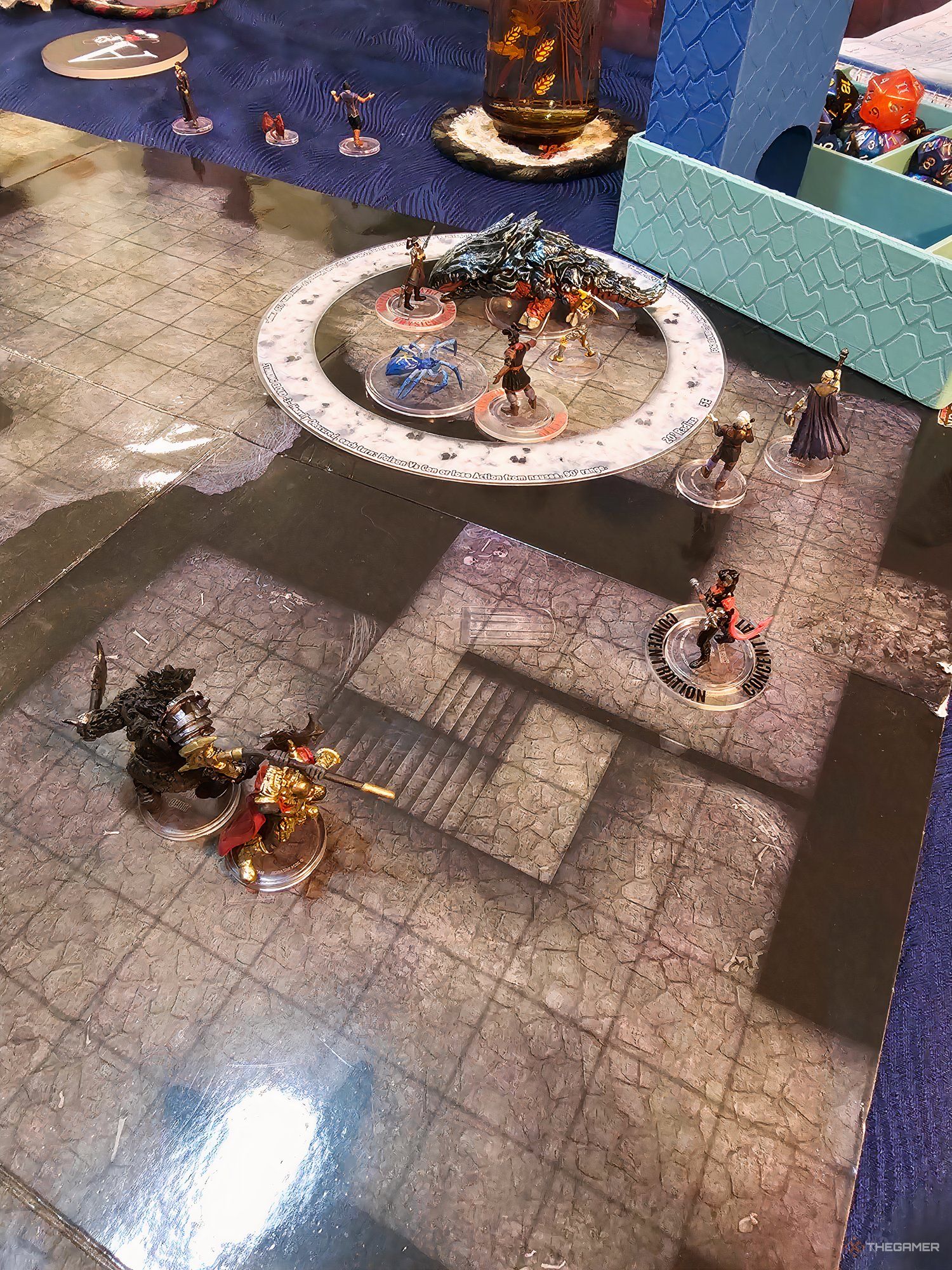 A table plays Dungeons & Dragons using the Baldur's Gate 3 Wizkids mini figures.