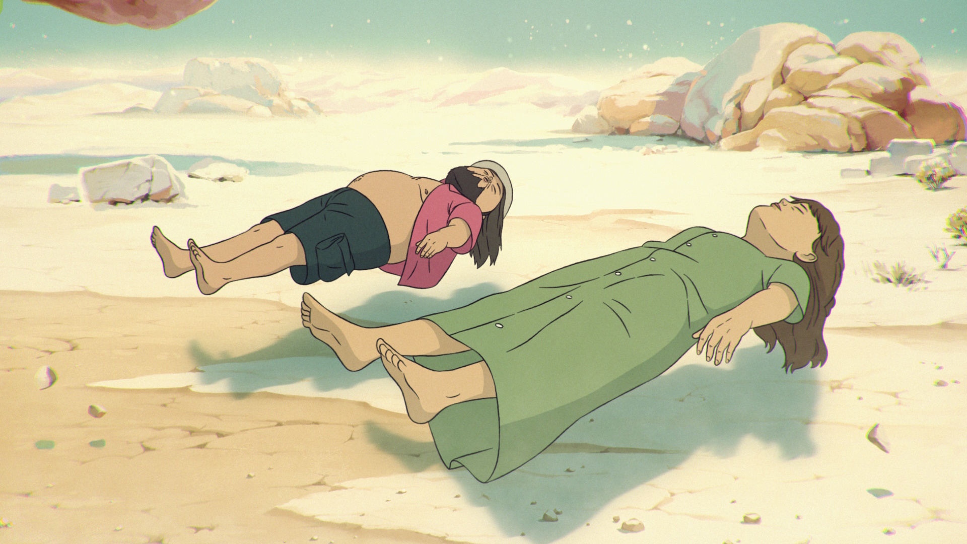 Common Side Effects still of Marshall and Frances floating over sand in a dreamlike state.