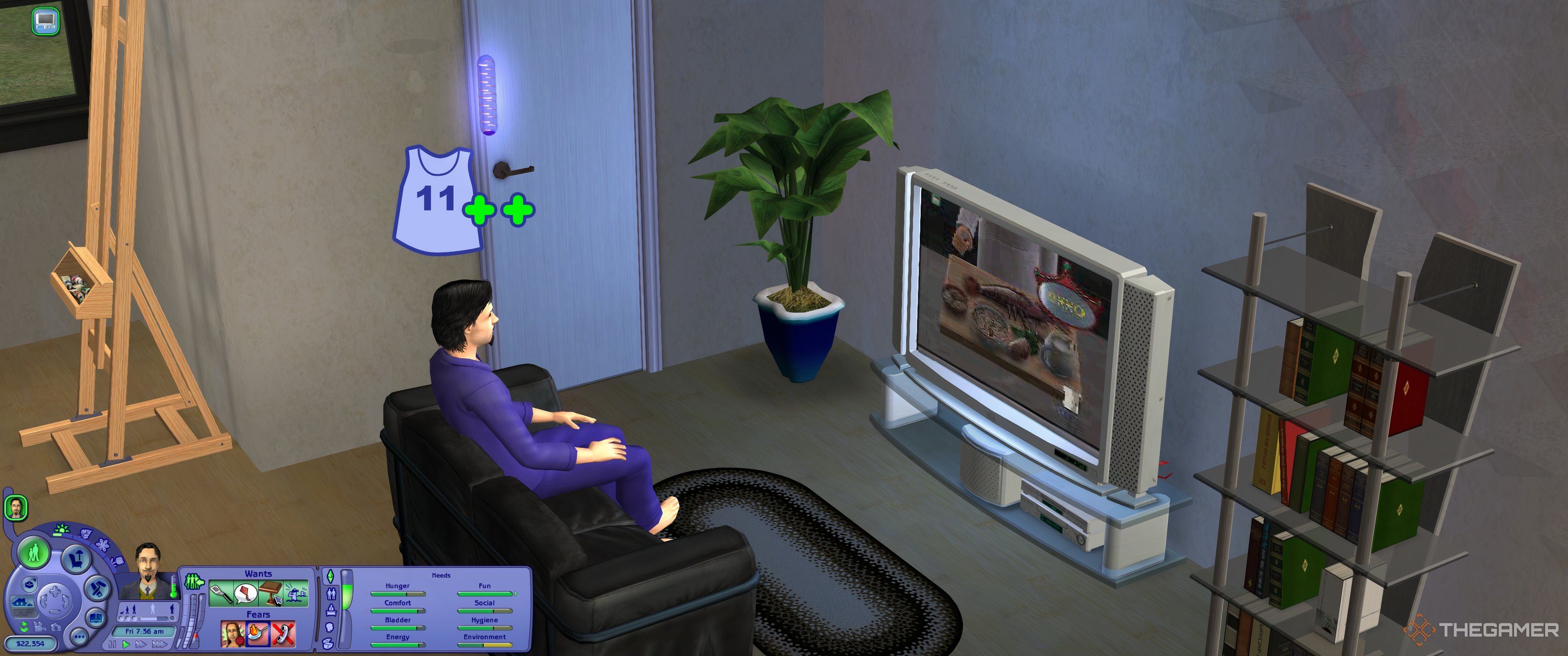 A sim watching the yummy channel on TV.