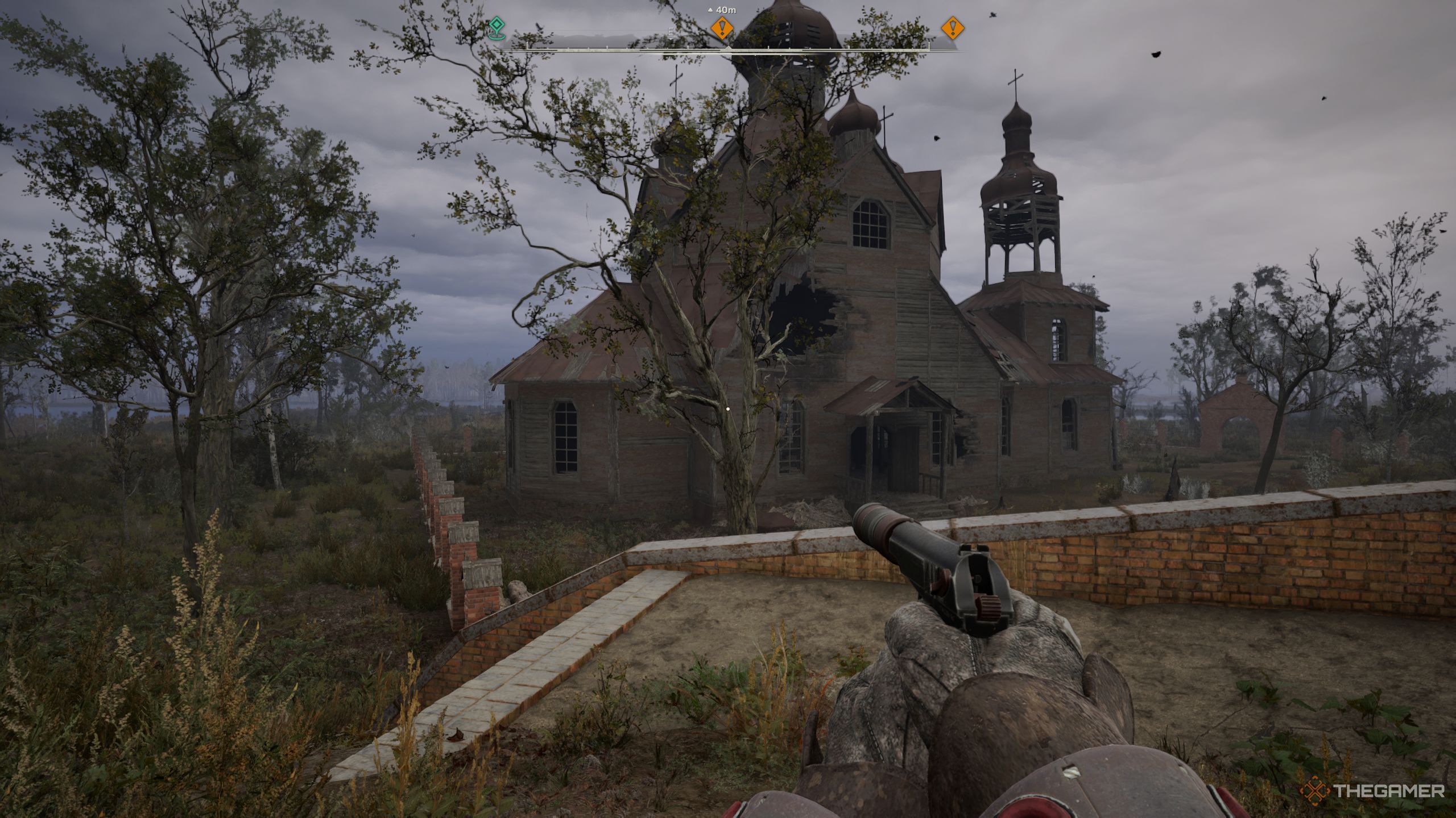 Skif equipped with his silenced pistol in front of the Old Church.