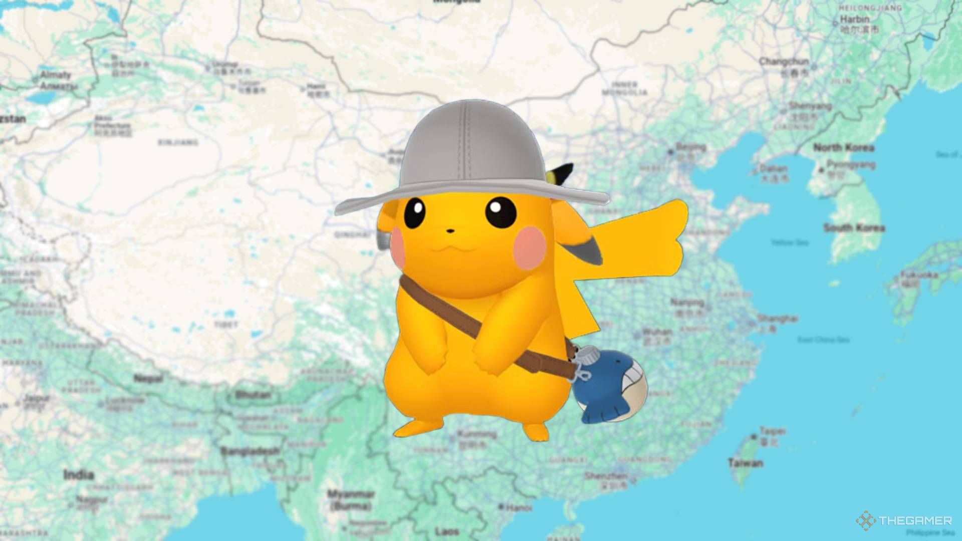 shiny Pikachu wearing an explorer hat over a map of China