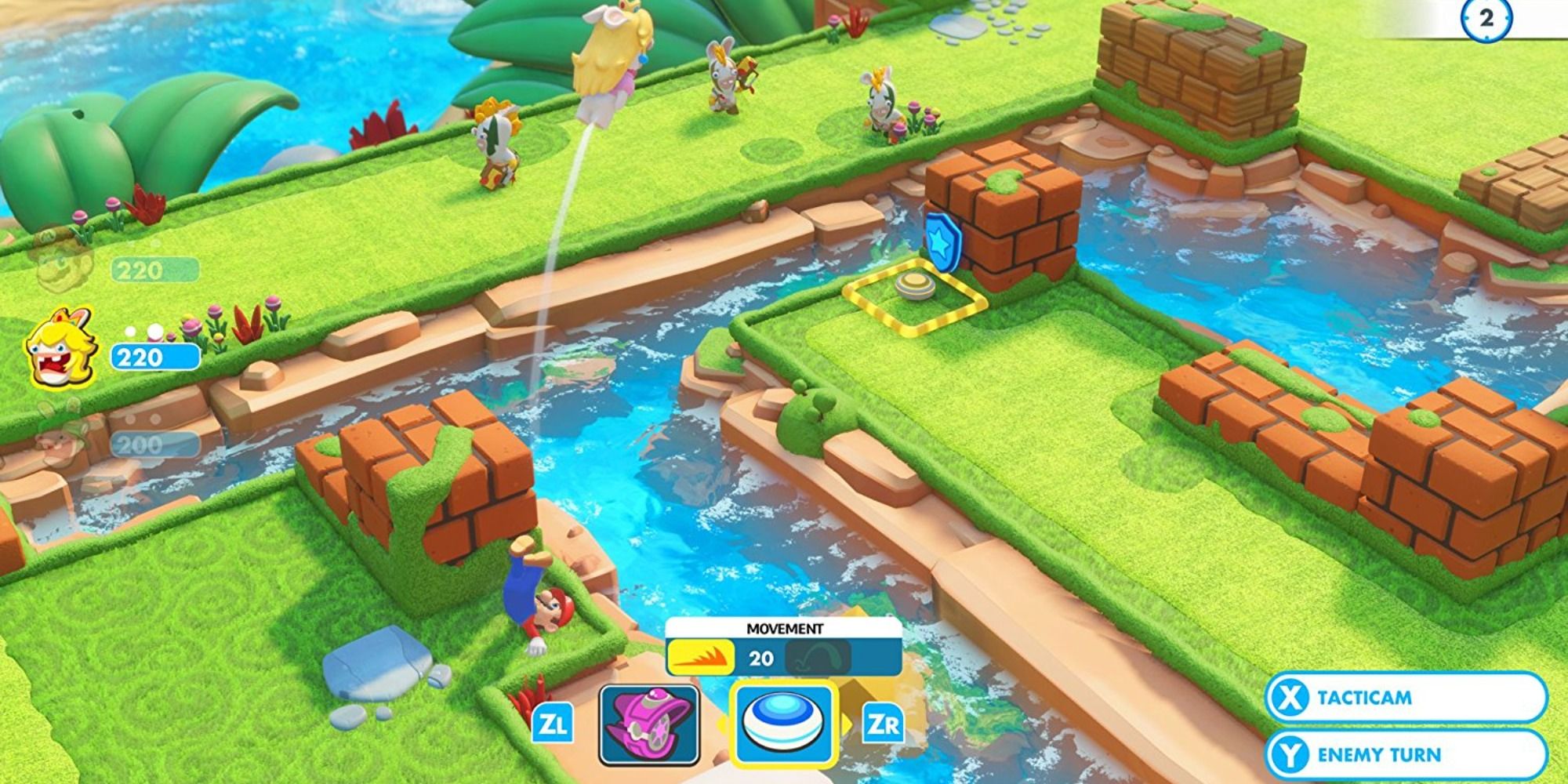A battle level with bridges and water in Mario + Rabbids Kingdom Battle.