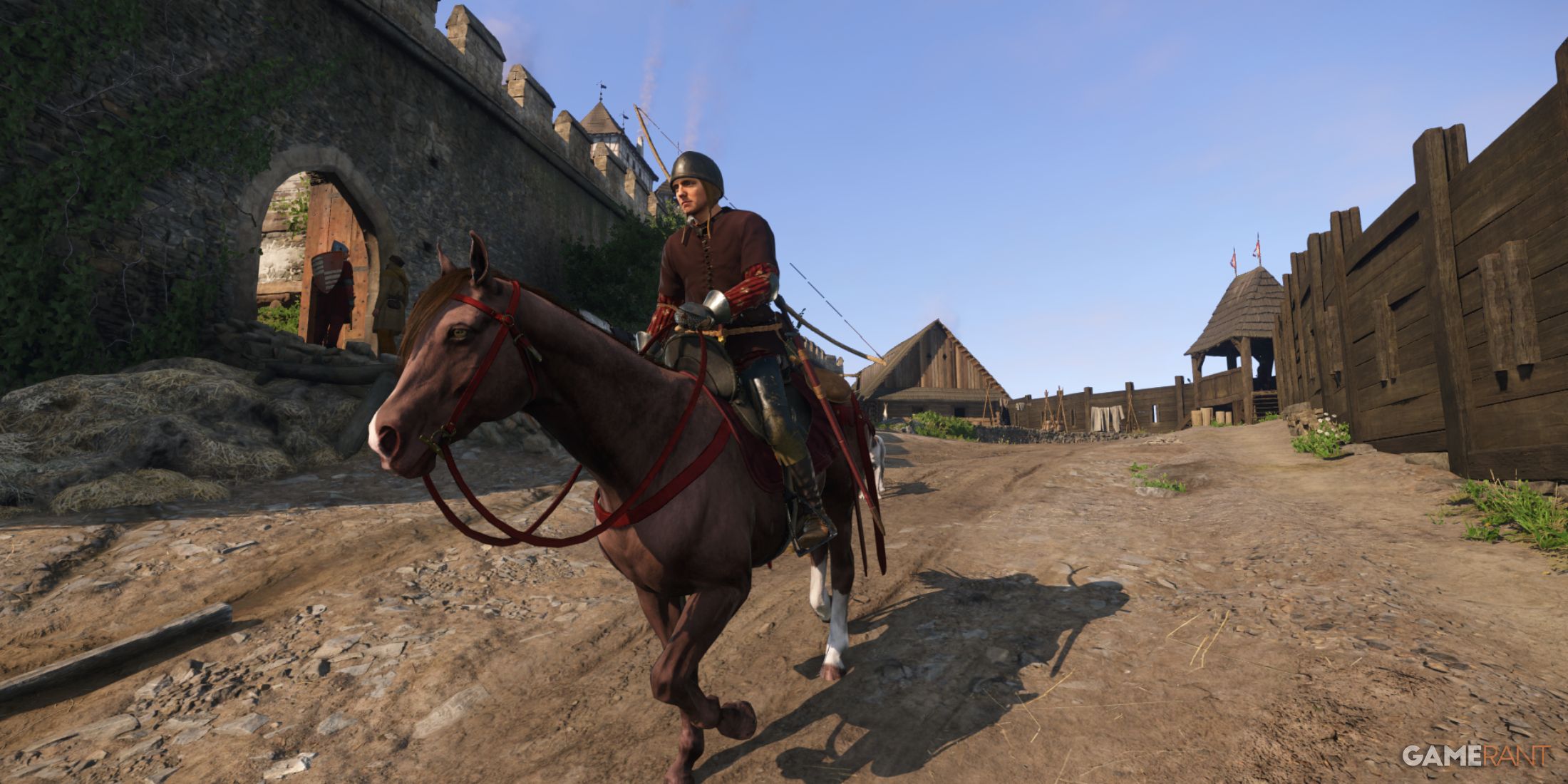 Herring, one of the best early game horses in Kingdom Come Deliverance 2, near a village