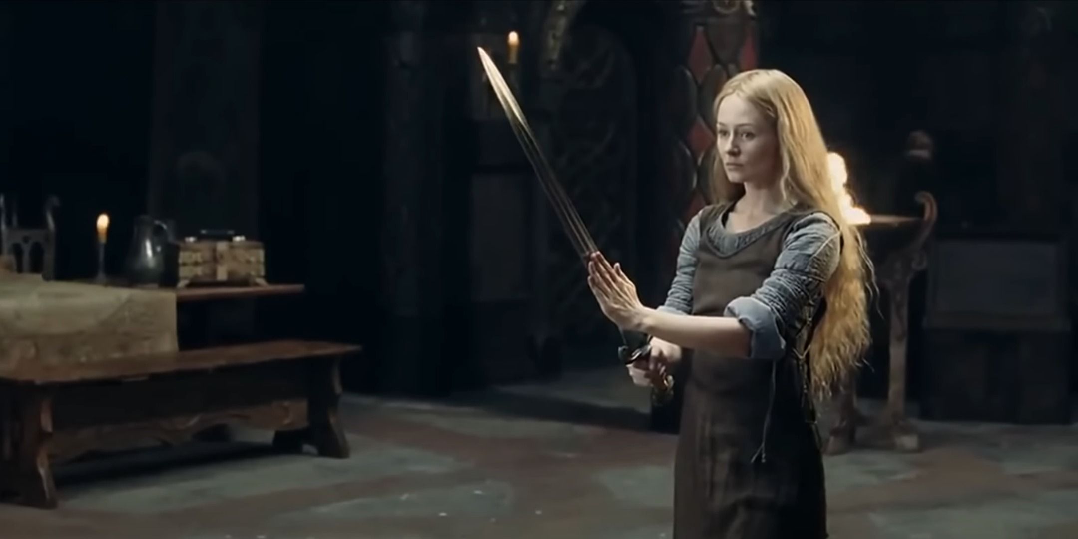 Eowyn wielding a sword in the Lord of the Rings: The Two Towers.