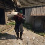 Kingdom Come Deliverance 2 screenshot of Henry carrying a sack