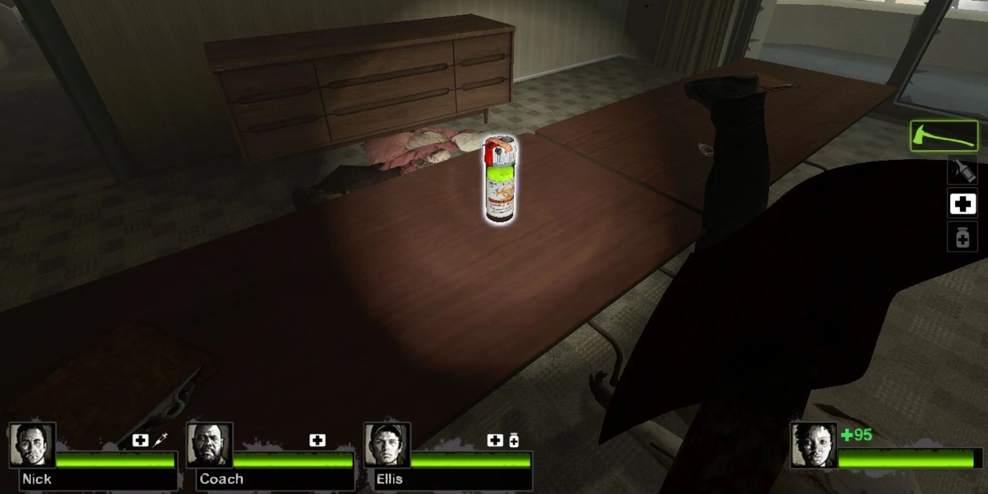 A canister full of a green liquid on a table in Left 4 Dead 2.