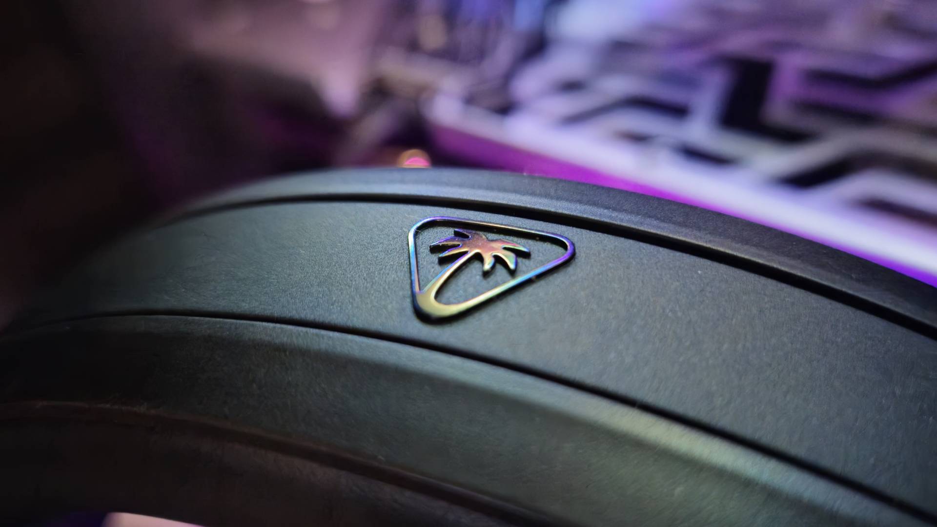 Photo taken by writer Rosalie Newcome of the Turtle Beach logo as seen on the Stealth 700 Gen 3 gaming headset headband.