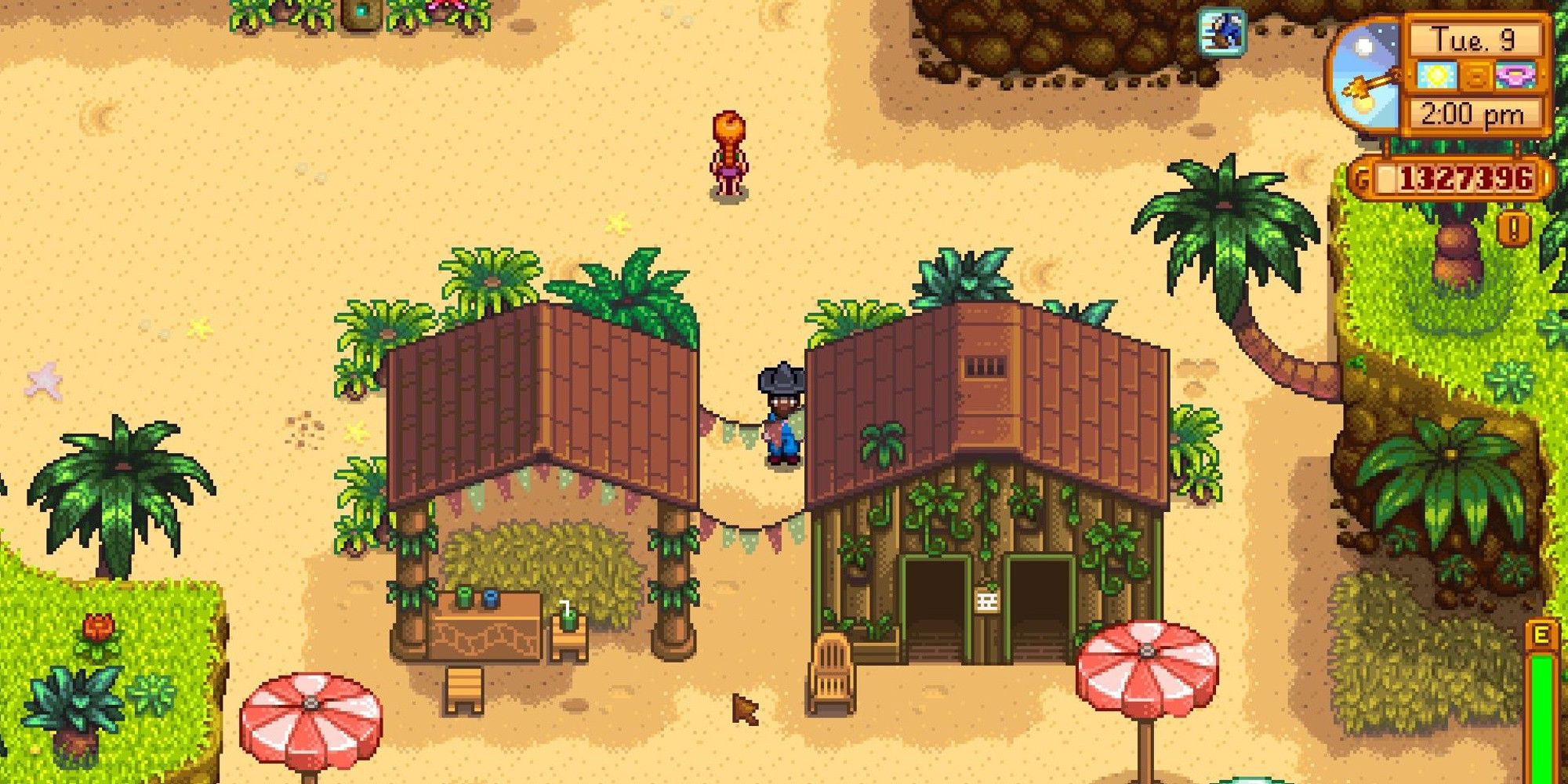 A player standing at beach resort near bungalos and palm trees in Stardew Valley.