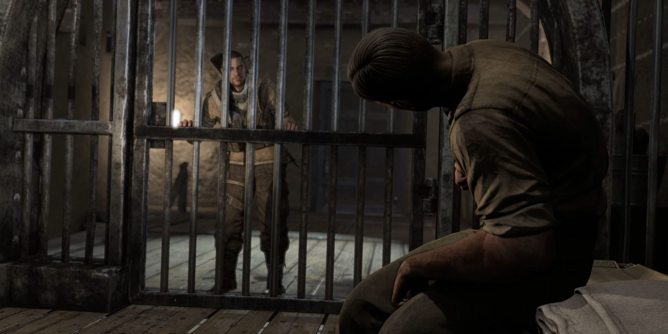 Karl Fairburne rescues the informant from his cell in Sniper Elite 3's Fort Riffugio.