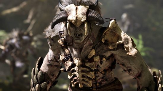 Ark 2 release date window: a humanoid monster with orc-like features wearing the skull of a horned creature. He is wearing bone armour.