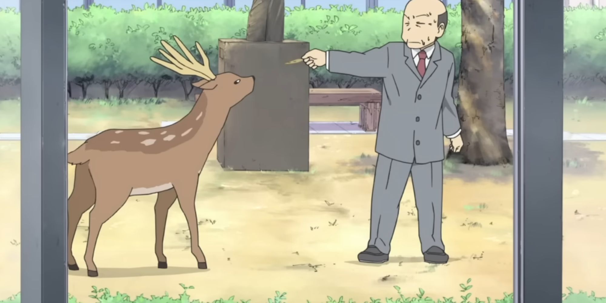 Principal Shinonome tries to give the deer a cookie.